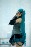 aqua_hair blouse cosplay detached_sleeves hatsune_miku headset kei pleated_skirt skirt tie twintails vocaloid rating:Safe score:2 user:nil!