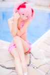 bikini_top cleavage cosplay hair_ribbons kaname_madoka mashiro_yuki miniskirt pink_hair pool puella_magi_madoka_magica skirt swimsuit twintails rating:Safe score:0 user:nil!