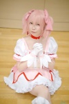 blouse choker cosplay gloves hairbows kaname_madoka kei kneehighs miniskirt pink_hair puella_magi_madoka_magica skirt twintails rating:Safe score:0 user:nil!