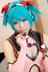 aqua_hair cleavage cosplay detached_sleeves dress elbow_gloves fingerless_gloves gloves hair_ribbons hatsune_miku headset keyholes project_diva twintails vocaloid wings world_is_mine_(vocaloid) yuri rating:Safe score:1 user:pixymisa