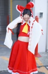 cosplay croptop detached_sleeves hairbow hakurei_reimu himari miko skirt sleeveless_blouse touhou rating:Safe score:0 user:nil!