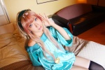 bed blouse cosplay hairband macross macross_frontier multi-colored_hair sachi_budou sheryl_nome shorts sunglasses thighhighs rating:Safe score:0 user:nil!
