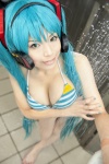 aqua_hair bikini cleavage cosplay hatsune_miku headset mashiro_yuki pool project_diva swimsuit twintails vocaloid wet rating:Safe score:11 user:nil!