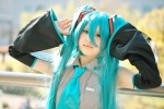 aqua_hair cosplay default_costume detached_sleeves hatsune_miku headset pleated_skirt sajou_erio skirt tie twintails vocaloid rating:Safe score:0 user:nil!