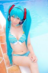 aqua_hair bikini cleavage cosplay hatsune_miku headset mashiro_yuki pool project_diva swimsuit twintails vocaloid wet rating:Safe score:0 user:nil!