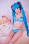 aqua_hair bathroom bathtub bikini cleavage cosplay hatsune_miku headset mashiro_yuki project_diva swimsuit twintails vocaloid rating:Safe score:0 user:nil!