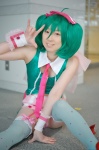 bow collar cosplay cuffs garter_straps green_hair hairbow macross macross_frontier microphone miki ranka_lee red_eyes shorts thighhighs tie twintails vest rating:Safe score:1 user:pixymisa