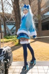 ageha blue_eyes blue_hair bow coat cosplay hairbow hatsune_miku pleated_skirt skirt thighhighs twintails vocaloid zettai_ryouiki rating:Safe score:0 user:pixymisa
