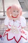 blouse choker cosplay gloves hairbows kaname_madoka miniskirt mizuki pink_hair puella_magi_madoka_magica skirt thighhighs twintails rating:Safe score:0 user:nil!