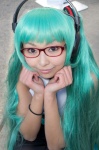 aqua_hair cosplay glasses hatsune_miku headphones necoco pleated_skirt skirt sleeveless_blouse thighhighs tie twintails vocaloid rating:Safe score:0 user:pixymisa