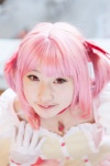 choker cosplay dress gloves hairbow kaname_madoka kujyou_konegi pink_hair puella_magi_madoka_magica red_eyes twintails rating:Safe score:0 user:pixymisa