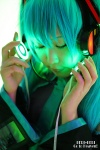 aqua_hair blouse chihane cosplay detached_sleeves hatsune_miku headset tie twintails vocaloid rating:Safe score:0 user:nil!