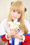 bed blonde_hair cosplay flower hairbow kanon_(series) kurata_sayuri school_uniform tsugihagi_mishin rating:Safe score:0 user:nil!