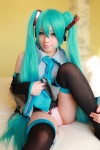 aqua_hair arai_yomi bed blouse cosplay detached_sleeves hatsune_miku headset panties pleated_skirt skirt thighhighs tie twintails vocaloid rating:Safe score:3 user:nil!