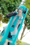 aqua_hair ayame blouse cosplay default_costume detached_sleeves hatsune_miku headset pleated_skirt skirt thighhighs tie twintails vocaloid zettai_ryouiki rating:Safe score:1 user:nil!