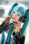 aqua_hair cosplay default_costume detached_sleeves hatsune_miku headset tie twintails uriu vocaloid rating:Safe score:0 user:nil!