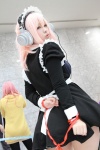 apron collar cosplay hairband headphones maid maid_uniform nitro_super_sonic pink_hair raimu_suzu_fuu ribbon ribbon_tie super_soniko rating:Safe score:0 user:pixymisa