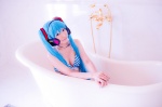 aqua_hair bathroom bathtub bikini_top cleavage cosplay hatsune_miku headset mashiro_yuki project_diva swimsuit twintails vocaloid rating:Safe score:0 user:nil!