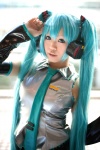 aqua_hair cosplay default_costume detached_sleeves hatsune_miku headset pleated_skirt skirt tie twintails uriu vocaloid rating:Safe score:0 user:nil!