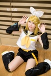 blonde_hair cosplay default_costume detached_sleeves hairbow hair_clips headset kagamine_rin rou sailor_uniform school_uniform shorts vocaloid rating:Safe score:0 user:nil!