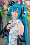 aqua_hair blouse chipon cosplay detached_sleeves hatsune_miku headset tie twintails vocaloid rating:Safe score:1 user:nil!