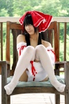 cosplay detached_sleeves hairbow hakurei_reimu lenfried miko nude thighhighs touhou rating:Questionable score:5 user:nil!