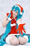 aqua_hair boots cosplay dress fuuka_(iv) gloves hatsune_miku santa_costume stocking_cap tagme_song twintails vocaloid rating:Questionable score:0 user:nil!