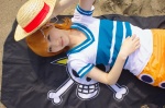beach cosplay flag kuuya miniskirt nami_(one_piece) one_piece orange_hair skirt straw_hat tshirt rating:Safe score:0 user:nil!