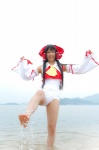 beach cosplay detached_sleeves hairbow hakurei_reimu lenfried ocean one-piece_swimsuit swimsuit touhou wet rating:Safe score:0 user:nil!