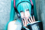 aqua_hair blouse cosplay detached_sleeves hatsune_miku headset hiroron tie twintails vocaloid rating:Safe score:0 user:nil!