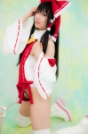 boots cosplay detached_sleeves hairbow hakurei_reimu handcuffs kneepads lenfried miko one-piece_swimsuit swimsuit thighhighs touhou rating:Safe score:0 user:nil!