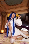 bed blue_hair boots choker cleavage cosplay dizzy guilty_gear hairbows hitori_gokko monokini one-piece_swimsuit saku swimsuit tail thighhighs underboob wings rating:Safe score:0 user:nil!