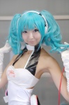 aqua_hair camisole cosplay elbow_gloves gloves hatsune_miku headset necoco racing_miku twintails vocaloid rating:Safe score:2 user:nil!