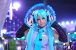 aqua_hair cosplay default_costume detached_sleeves hatsune_miku headset tie toa twintails vocaloid rating:Safe score:0 user:pixymisa