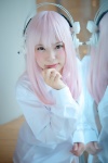 blouse cosplay headphones hiiragi_haruka nitro_super_sonic pink_eyes pink_hair super_soniko rating:Safe score:0 user:pixymisa