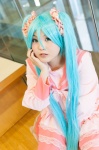 aqua_eyes aqua_hair cosplay dress hatsune_miku tiered_skirt toko_(ii) twintails vocaloid rating:Safe score:0 user:pixymisa