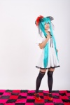 aqua_hair cosplay dress hairbows hatsune_miku natsu_yuki thighhighs twintails vocaloid zettai_ryouiki rating:Safe score:1 user:pixymisa