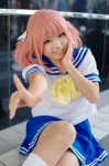 cosplay hair_ribbons kobayakawa_yutaka lucky_star miku pink_hair pleated_skirt sailor_uniform school_uniform skirt socks twintails rating:Safe score:0 user:nil!