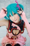 aqua_hair chii cleavage cosplay dress elbow_gloves fingerless_gloves garter_belt gloves hairbows hatsune_miku project_diva stirrup_socks twintails vocaloid wings world_is_mine_(vocaloid) rating:Safe score:1 user:nil!