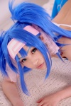 bed blue_hair bodysuit buyara cosplay hair_ribbons headband klan_klein macross macross_frontier twintails rating:Safe score:0 user:nil!