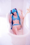 aqua_hair bathroom bathtub bikini cleavage cosplay hatsune_miku headset mashiro_yuki project_diva swimsuit twintails vocaloid rating:Safe score:0 user:nil!