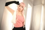 blouse cosplay elbow_gloves gloves happy_synthesizer_(vocaloid) headset makise_anji megurine_luka pink_hair skirt vest vocaloid rating:Safe score:0 user:xkaras