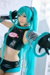 aira aqua_hair cosplay croptop elbow_gloves gloves hatsune_miku headset pantyhose project_diva shorts sleeveless twintails vocaloid rating:Safe score:0 user:nil!