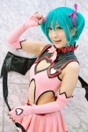 aqua_hair chii cleavage cosplay dress elbow_gloves fingerless_gloves gloves hairbows hatsune_miku project_diva tail twintails vocaloid world_is_mine_(vocaloid) rating:Safe score:1 user:nil!