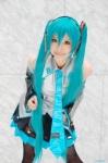 aqua_hair cosplay default_costume detached_sleeves hatsune_miku headset pleated_skirt saya skirt thighhighs tie twintails vocaloid rating:Safe score:0 user:nil!
