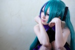 aqua_hair blouse cosplay fishnet_stockings hatsune_miku noa petticoat pleated_skirt skirt thighhighs tie twintails vocaloid rating:Safe score:0 user:pixymisa