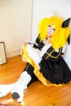 blonde_hair boots cosplay detached_sleeves dress hairbow kagamine_rin leggings meltdown_(vocaloid) saku scene_ever_4 twintails vocaloid rating:Safe score:0 user:nil!