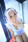 cleavage cosplay headphones nearly_naked_apron nitro_super_sonic pink_hair saku super_soniko rating:Safe score:1 user:nil!