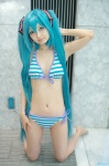 aqua_hair bikini blue_eyes cosplay hair_ribbons hatsune_miku sakuya_mikoto swimsuit twintails vocaloid rating:Safe score:2 user:pixymisa