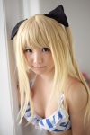 bikini_top blonde_hair cleavage cosplay enako golden_darkness hairbows swimsuit to_love-ru twintails rating:Safe score:7 user:nil!